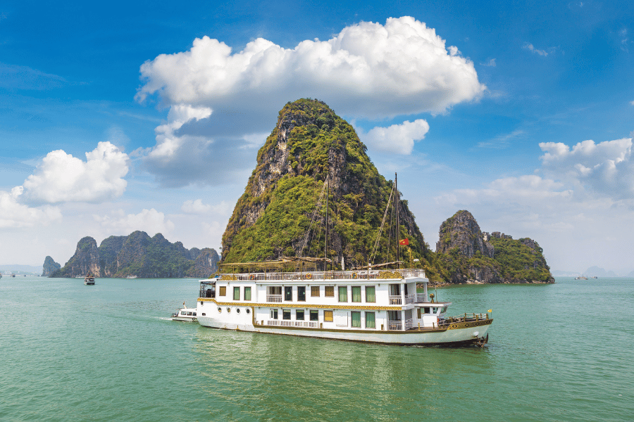 Day 3: Halong Bay Overnight Cruise – Limestone Caves, Kayaking, Sunset Views & Onboard Activities